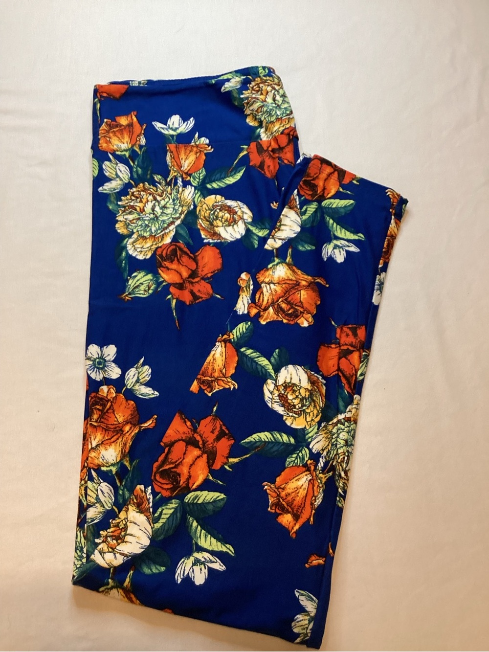LuLaRoe Blue Floral Leggings with Orange & White Flowers
